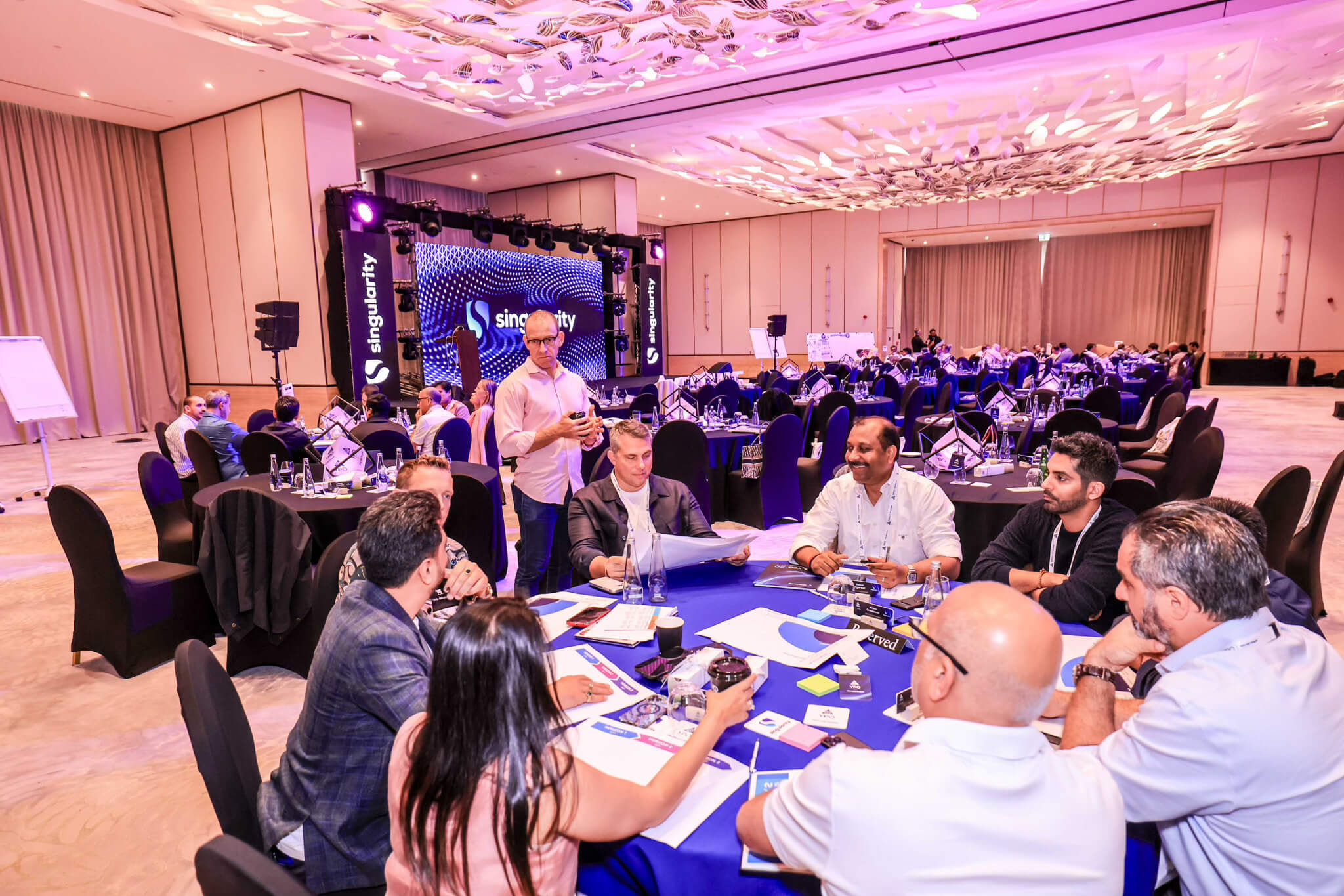 A team collaborating through a full-day hands-on AI workshop